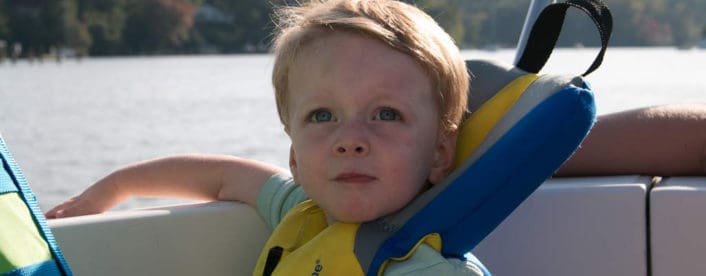 Picture of a child with a PFD