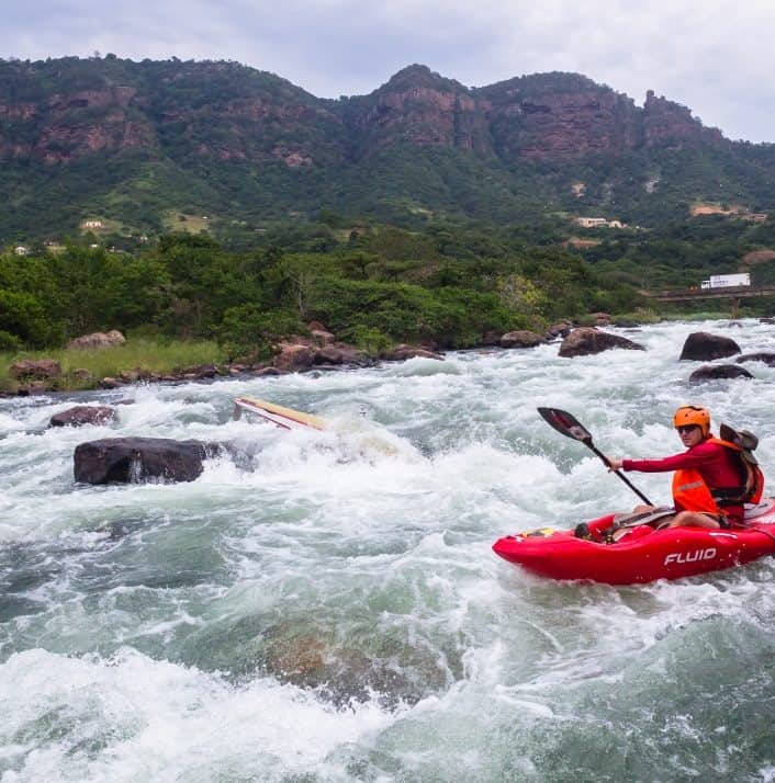 Kayaking On A Class III Rapid