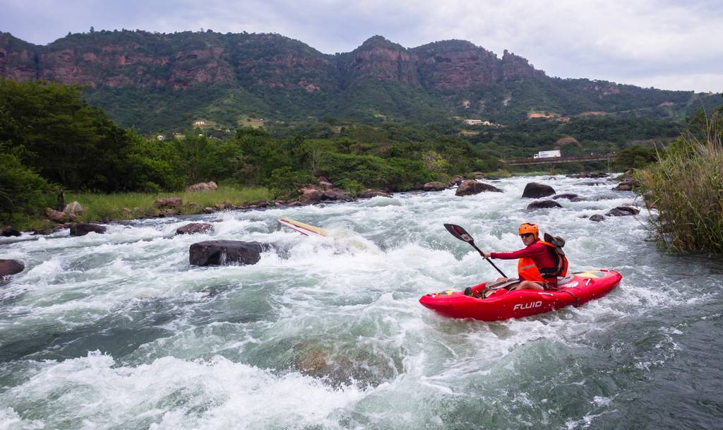 Kayaking On A Class III Rapid